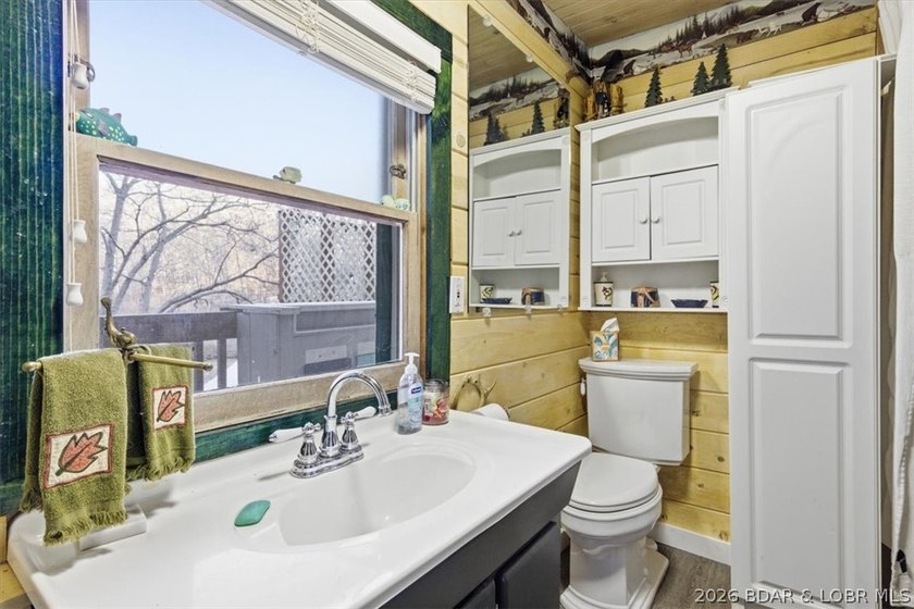 Charming lakefront cabin delivers the perfect blend of - photo 21