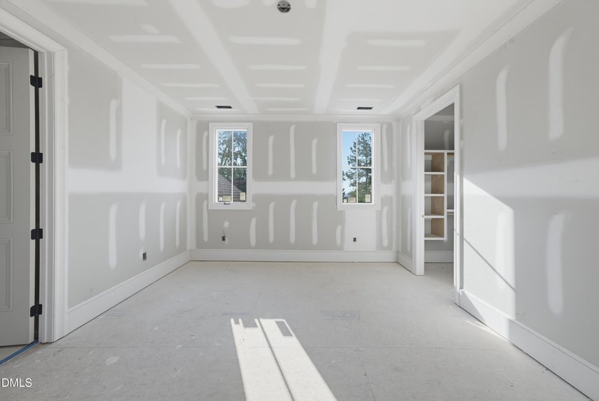 Crafted by Wagoner Homes, this extraordinary 5,032-square-foot - photo 32