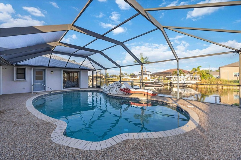 SAILBOAT LOT!! NO BRIDGES!! This canal home with seawall and - photo 2