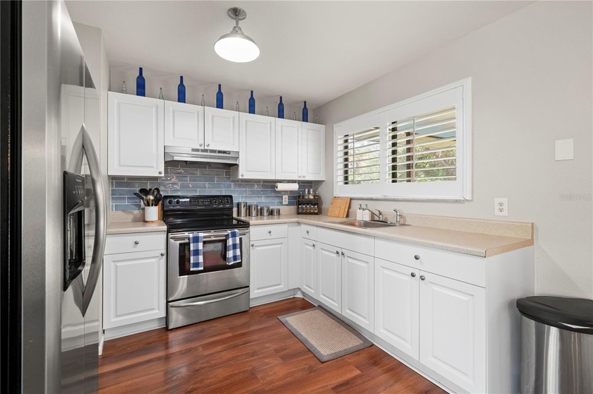 STOP in and discover all this beautifully updated Port Charlotte - photo 12