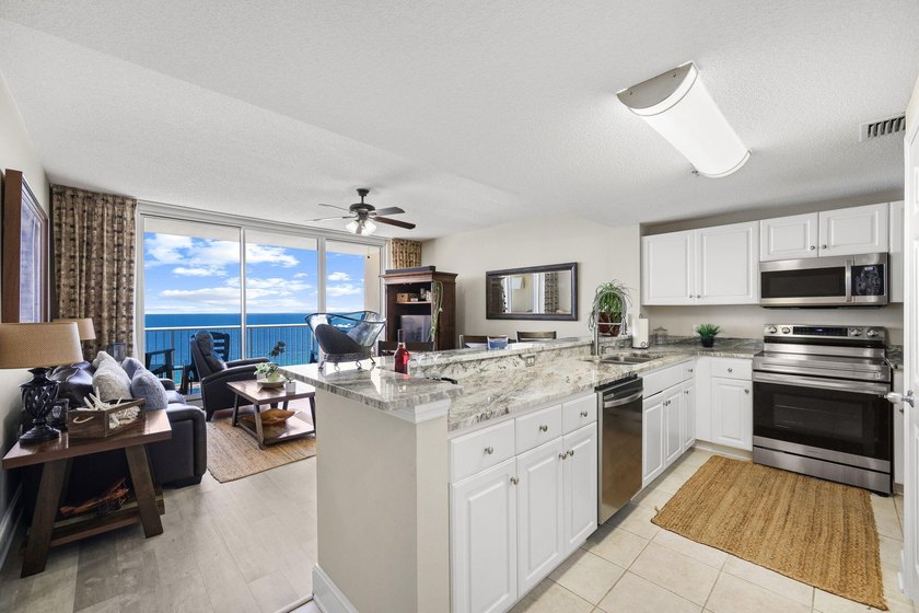 Wake up to sweeping Gulf views from this beautifully updated - photo 18