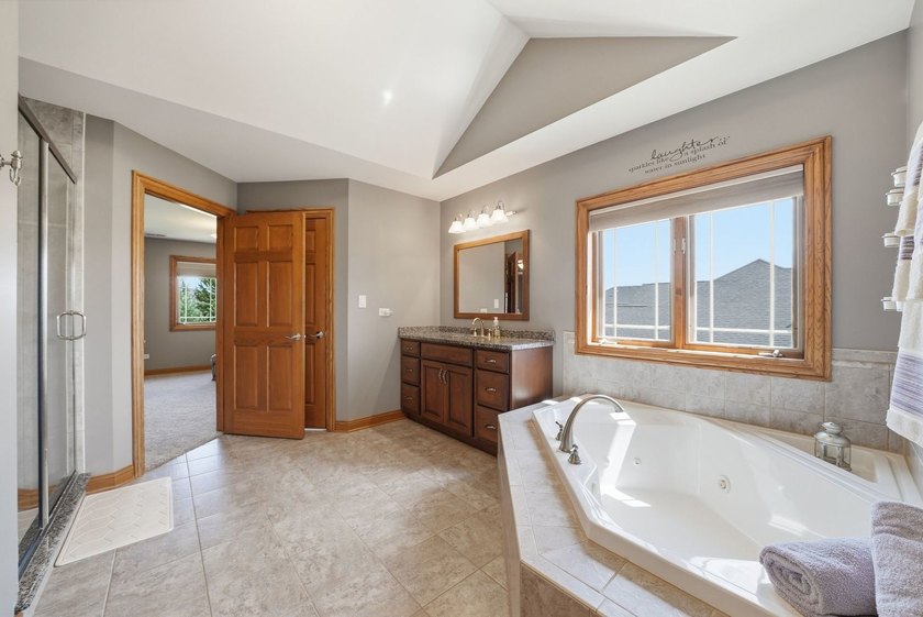 Welcome to your half-acre Sunset Lakes oasis! This custom-built - photo 23