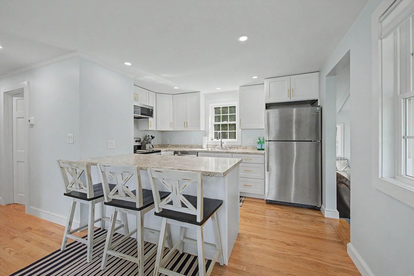Designed for the way we live today, this beautifully updated - photo 9