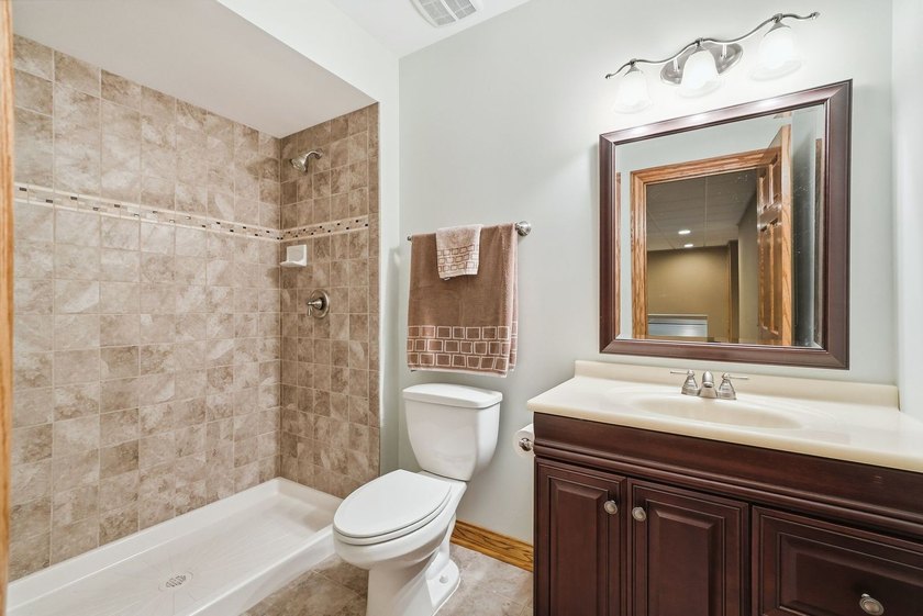 Welcome to your half-acre Sunset Lakes oasis! This custom-built - photo 38