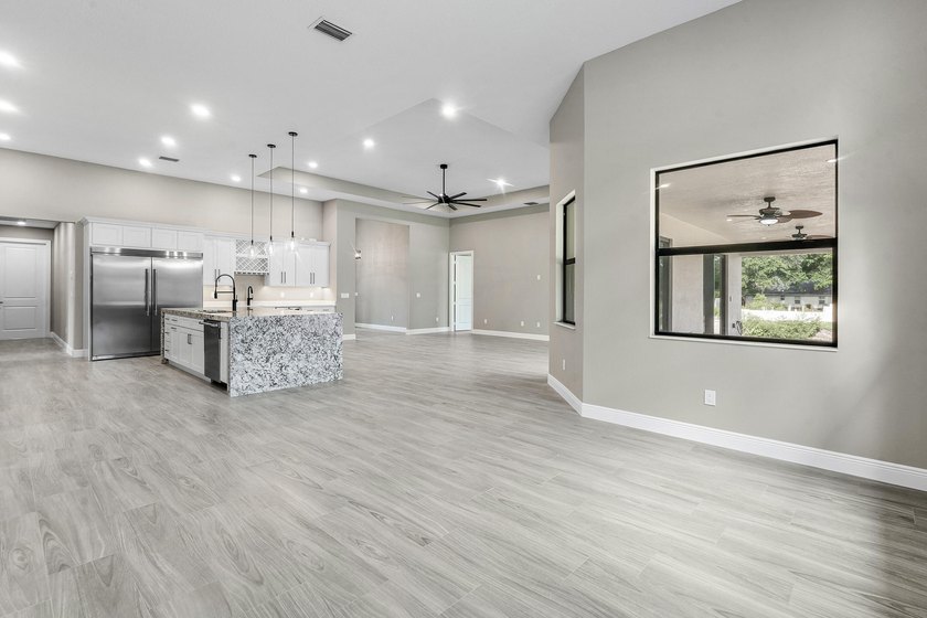 Exceptional new construction in Jupiter Farms with high-end - photo 11
