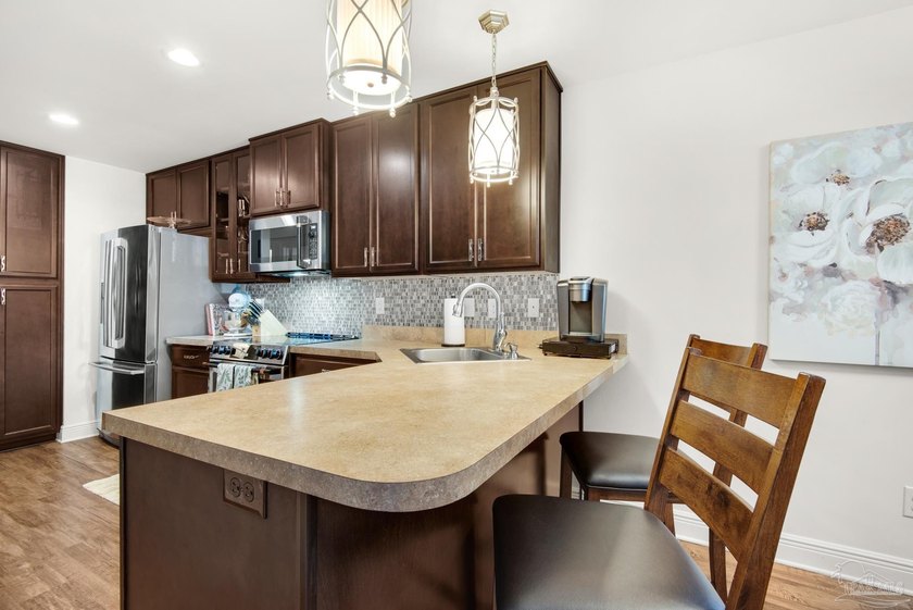 Offered FULLY Furnished ! Whether you're seeking a turnkey - photo 12