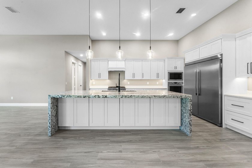 Exceptional new construction in Jupiter Farms with high-end - photo 14