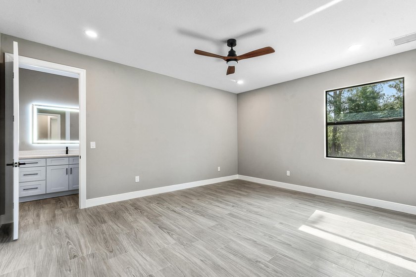 Exceptional new construction in Jupiter Farms with high-end - photo 24