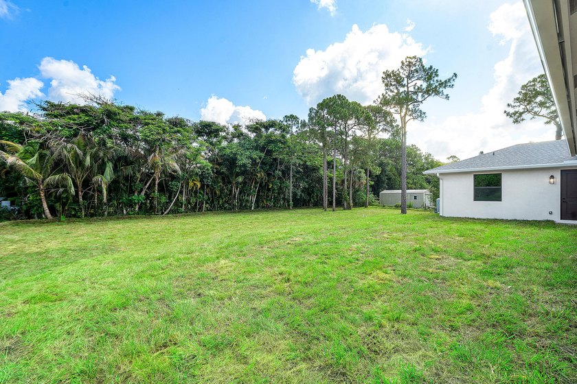 Exceptional new construction in Jupiter Farms with high-end - photo 49