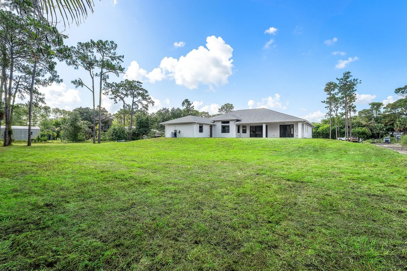 Exceptional new construction in Jupiter Farms with high-end - photo 50