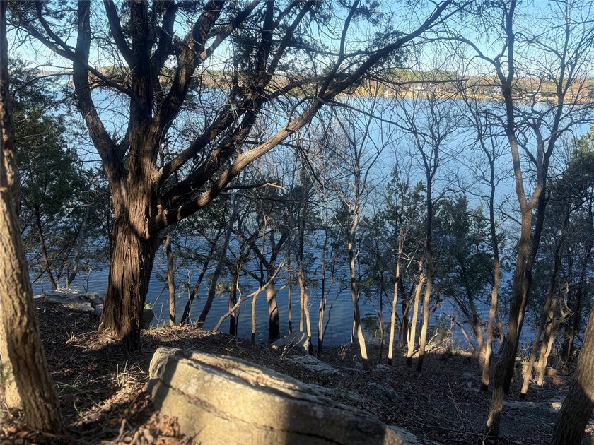 The moment you arrive at this stunning waterfront lot, you'll be - photo 21