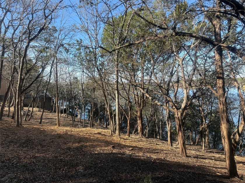 The moment you arrive at this stunning waterfront lot, you'll be - photo 22