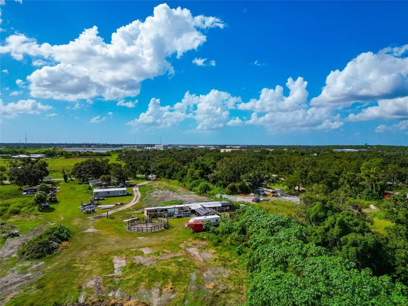 19.96 ACRES MINUTES FROM I-75 AND FRUITVILLE ROAD!!! Two - photo 16
