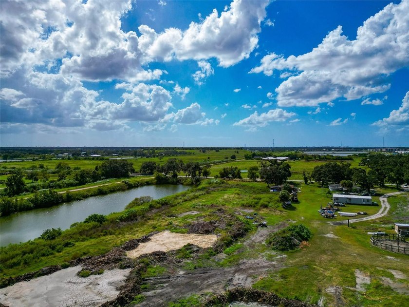 19.96 ACRES MINUTES FROM I-75 AND FRUITVILLE ROAD!!! Two - photo 17