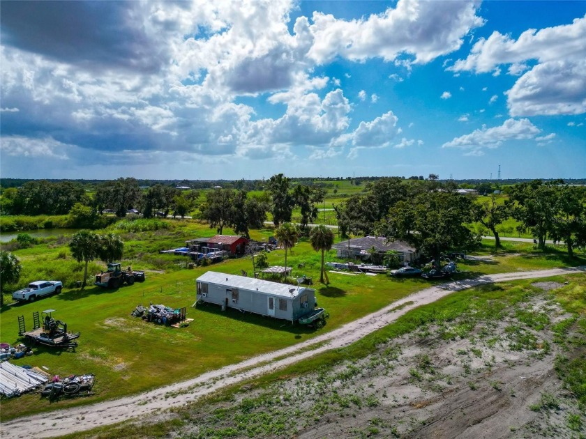 19.96 ACRES MINUTES FROM I-75 AND FRUITVILLE ROAD!!! Two - photo 22
