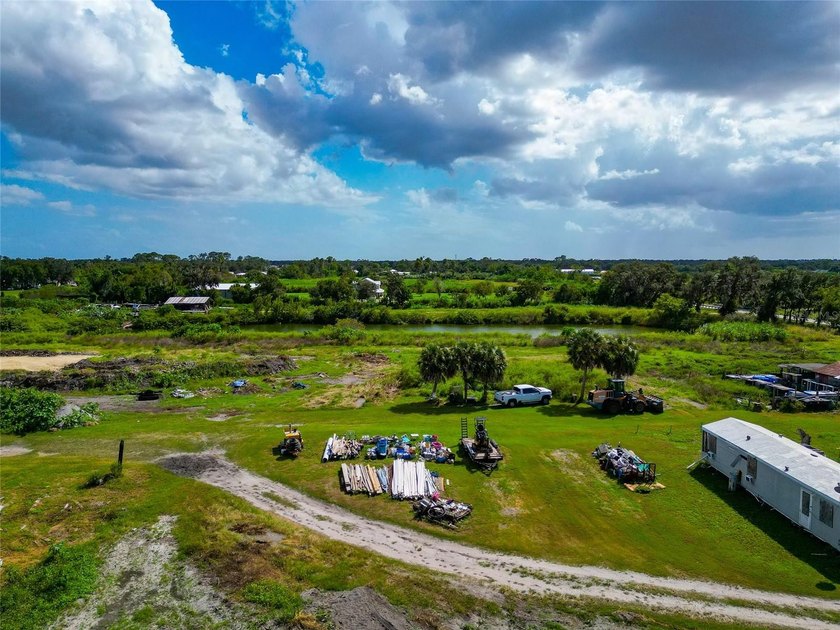 19.96 ACRES MINUTES FROM I-75 AND FRUITVILLE ROAD!!! Two - photo 23