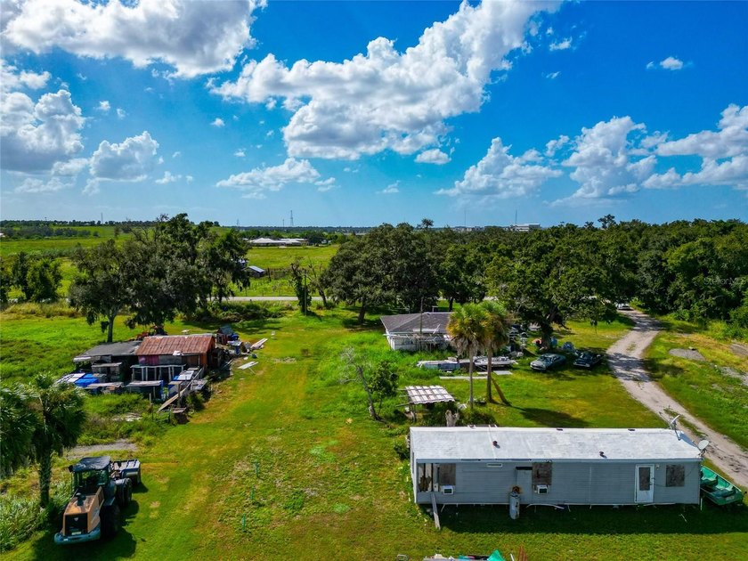 19.96 ACRES MINUTES FROM I-75 AND FRUITVILLE ROAD!!! Two - photo 24