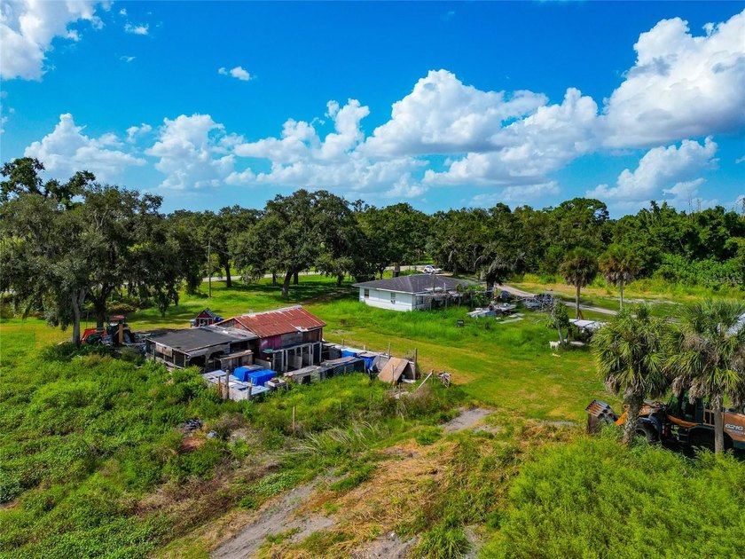 19.96 ACRES MINUTES FROM I-75 AND FRUITVILLE ROAD!!! Two - photo 25
