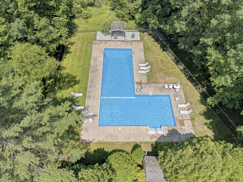 Tucked within a beautifully maintained neighborhood surrounded - photo 5