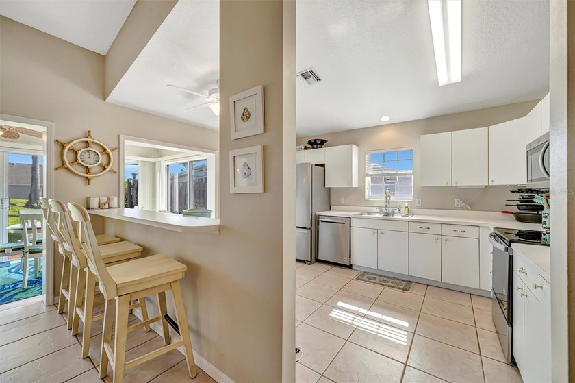 Experience easygoing Florida living in this spacious 3-bedroom - photo 11