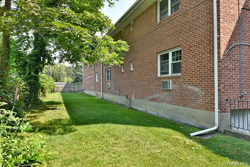 Welcome To 295 Merrick Road, Unit 4A ! This Maintenance Free - photo 15
