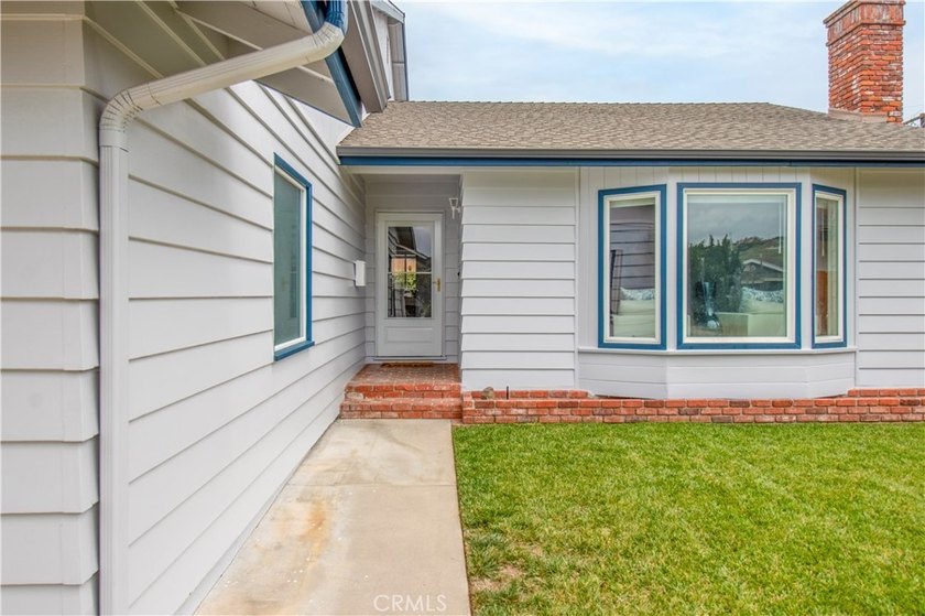 This is a 4 bedroom/2 bathroom home that was partially remodeled - photo 2