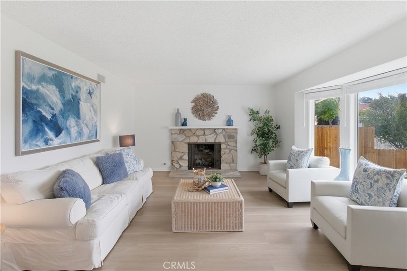 This is a 4 bedroom/2 bathroom home that was partially remodeled - photo 3