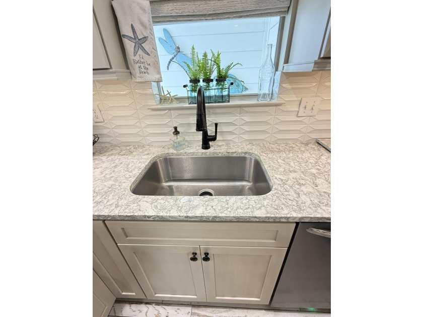 Located one block from Crystal beach and move-in ready...a - photo 14