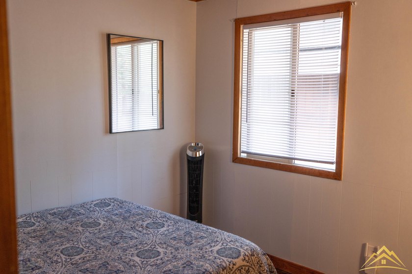 Tucked among the pines of Au Sable Acres, this fully furnished - photo 12