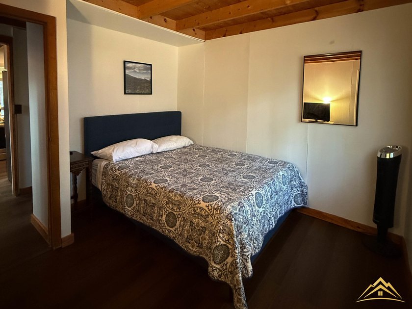 Tucked among the pines of Au Sable Acres, this fully furnished - photo 13