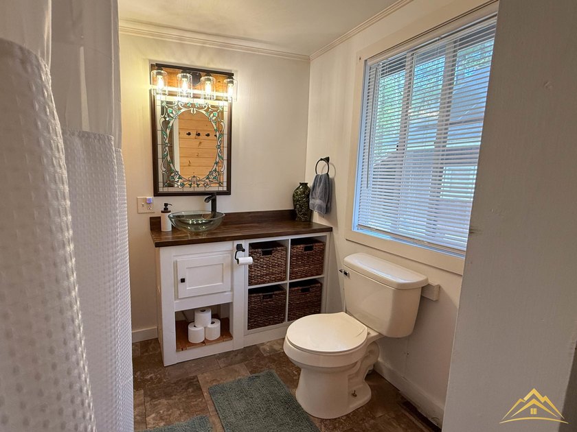 Tucked among the pines of Au Sable Acres, this fully furnished - photo 17