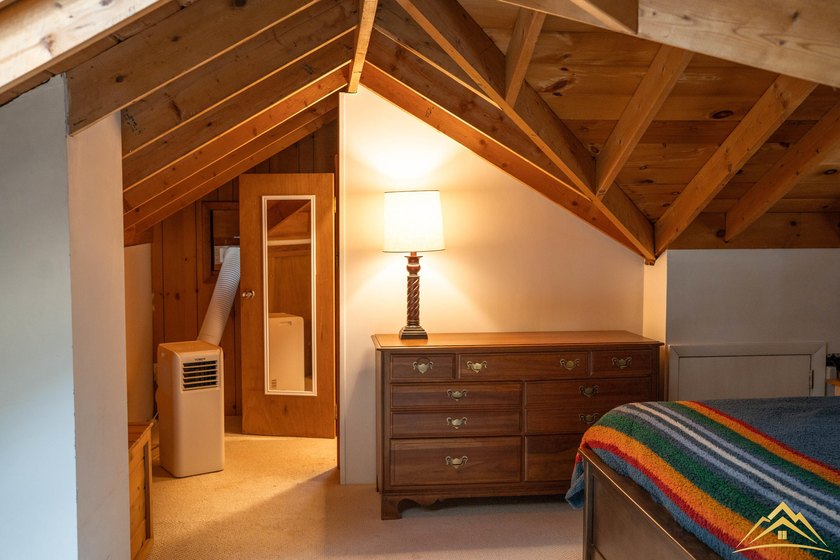 Tucked among the pines of Au Sable Acres, this fully furnished - photo 19