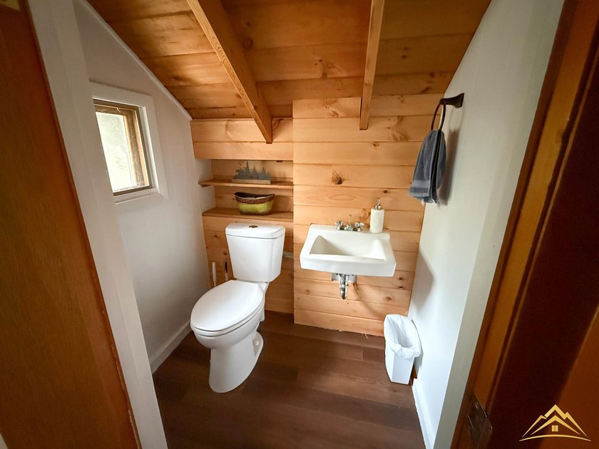 Tucked among the pines of Au Sable Acres, this fully furnished - photo 20