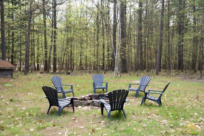 Tucked among the pines of Au Sable Acres, this fully furnished - photo 23
