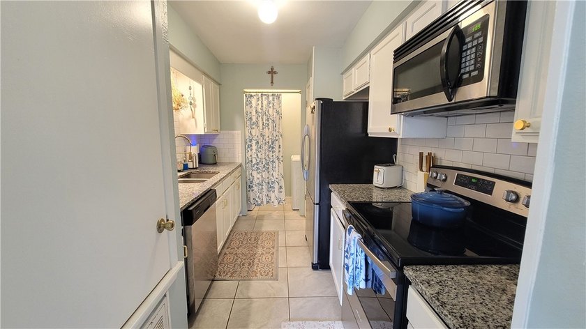 What an AMAZING home!!! This beautiful townhome boasts 2 HUGE - photo 8