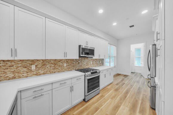 Discover a modern 4-bedroom, 3.5-bath residence (built 2016) in - photo 13