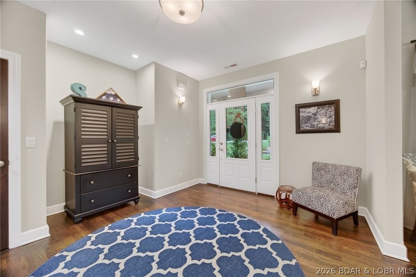 Set on a beautifully landscaped, nearly one-acre lot in The - photo 15