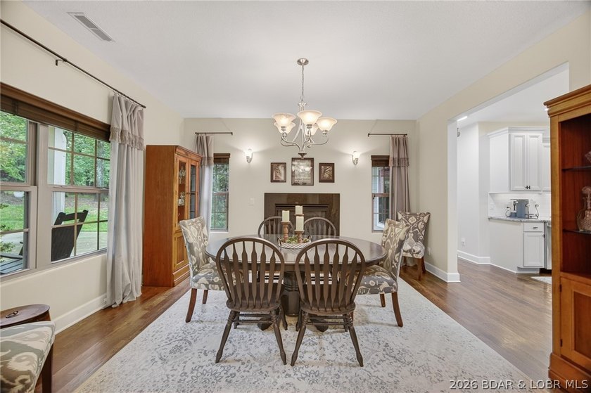 Set on a beautifully landscaped, nearly one-acre lot in The - photo 16