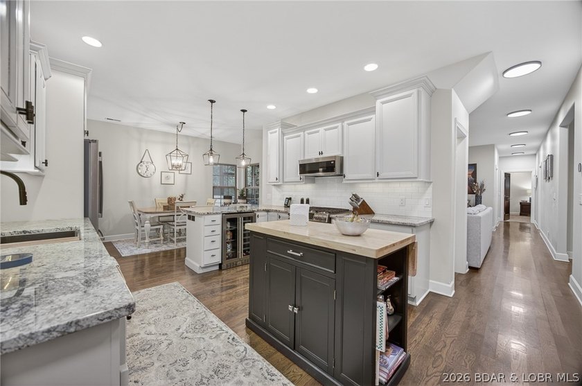 Set on a beautifully landscaped, nearly one-acre lot in The - photo 19