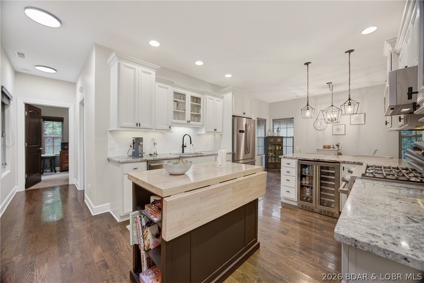 Set on a beautifully landscaped, nearly one-acre lot in The - photo 20
