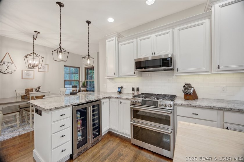 Set on a beautifully landscaped, nearly one-acre lot in The - photo 21