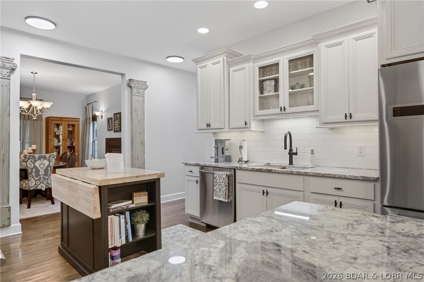 Set on a beautifully landscaped, nearly one-acre lot in The - photo 23