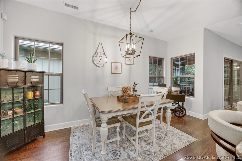 Set on a beautifully landscaped, nearly one-acre lot in The - photo 25
