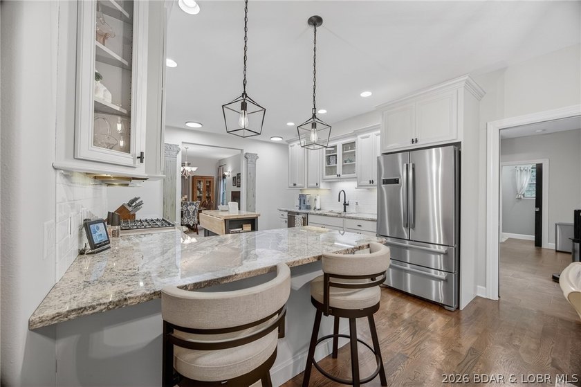 Set on a beautifully landscaped, nearly one-acre lot in The - photo 27