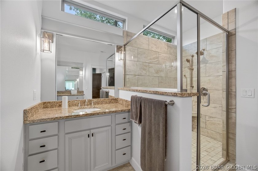 Set on a beautifully landscaped, nearly one-acre lot in The - photo 49