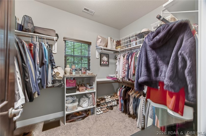 Set on a beautifully landscaped, nearly one-acre lot in The - photo 50