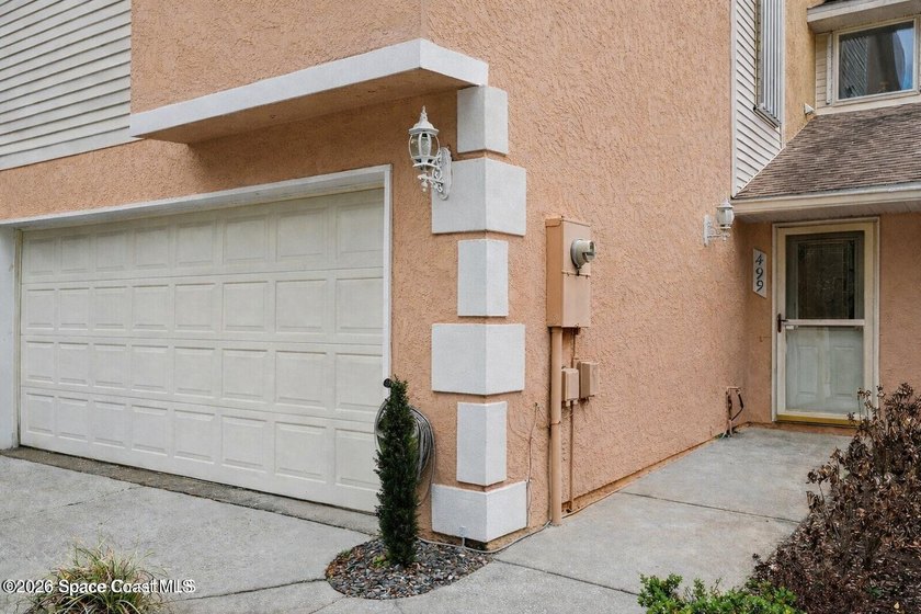 Centrally located in Titusville, this 2-bedroom, 2.5-bath - photo 3