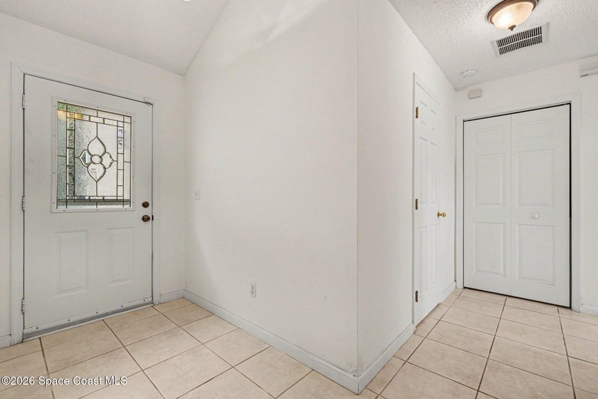 Centrally located in Titusville, this 2-bedroom, 2.5-bath - photo 4