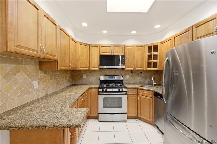 Welcome to this charming two-family Colonial-style duplex in the - photo 6