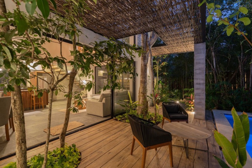 Villa 2 is a remarkable 4-bedroom, 4-bathroom residence nestled - photo 2